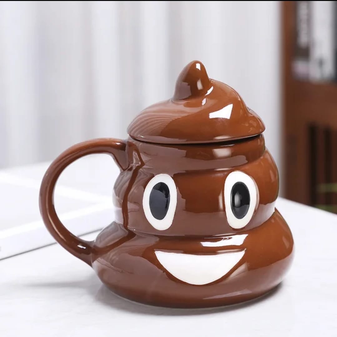 A brown ceramic mug designed to resemble a smiling poop emoji with big eyes.