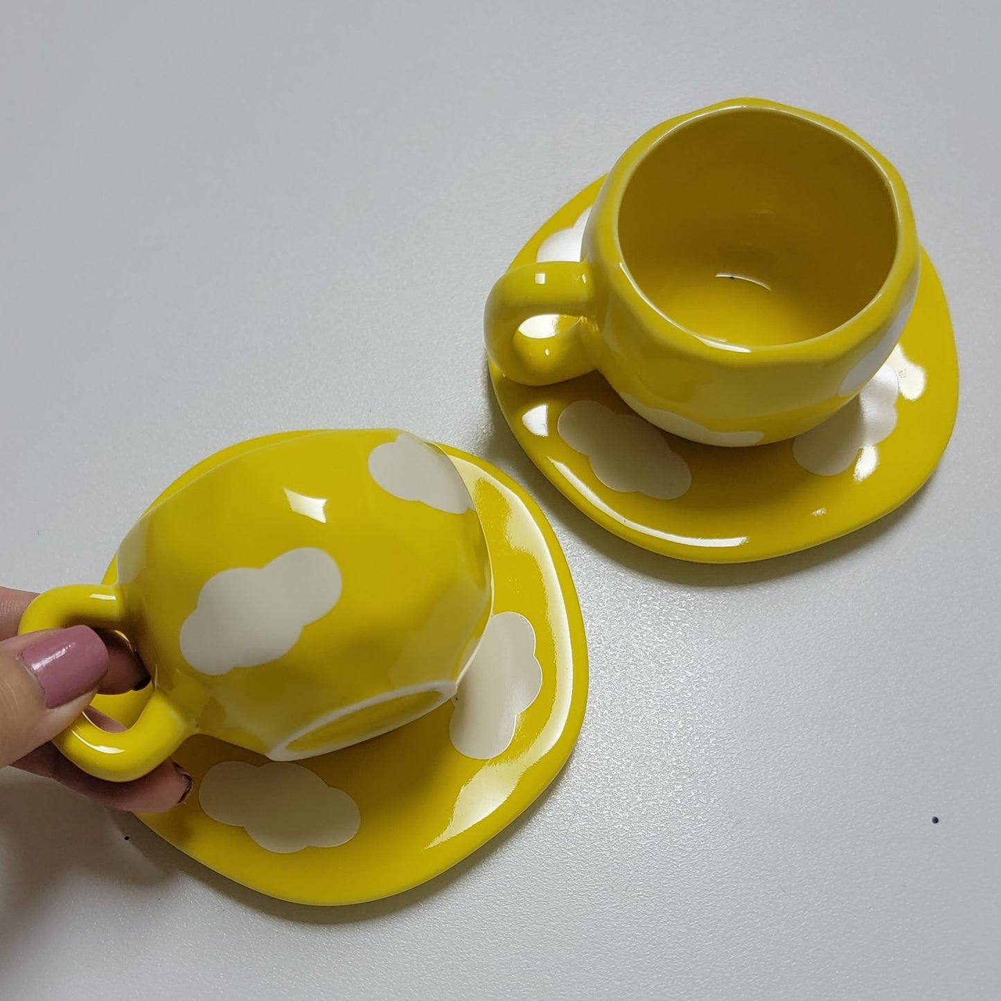 2 espresso cups and coasters yellow