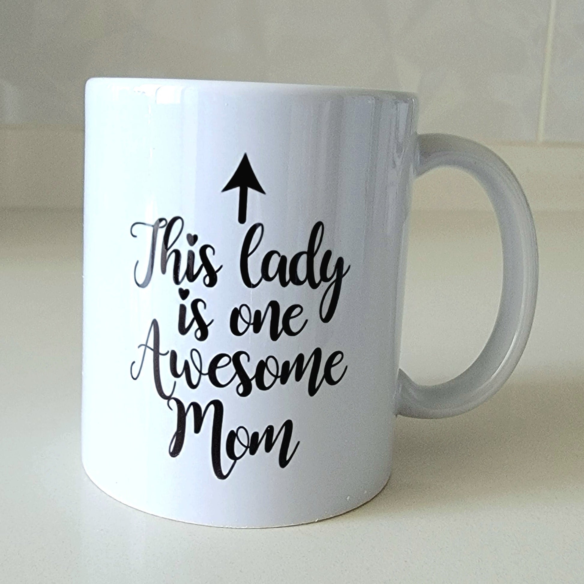 White mug with text 'This lady is one Awesome Mom' 