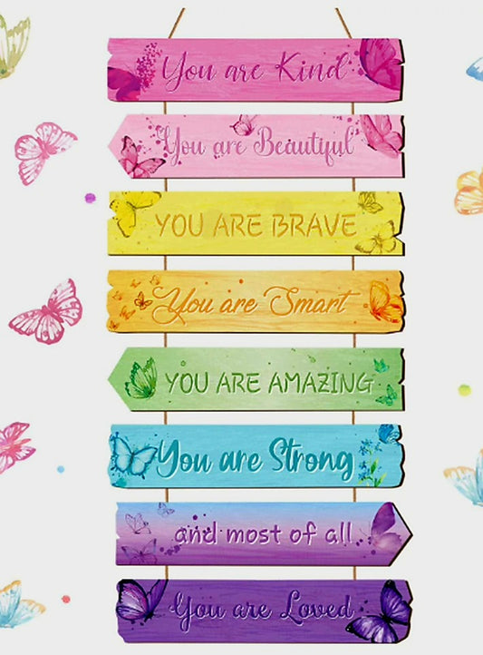 Colorful motivational phrases on wooden planks 