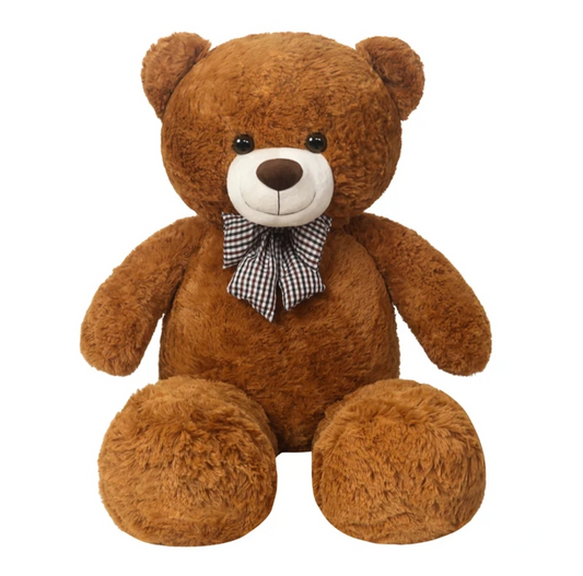 Brown teddy bear with a checkered bow tie on a white background