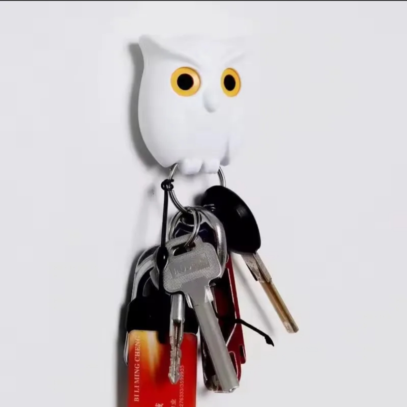White owl key holder blinks