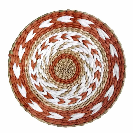 Round woven wall plate with concentric circle pattern in red, beige